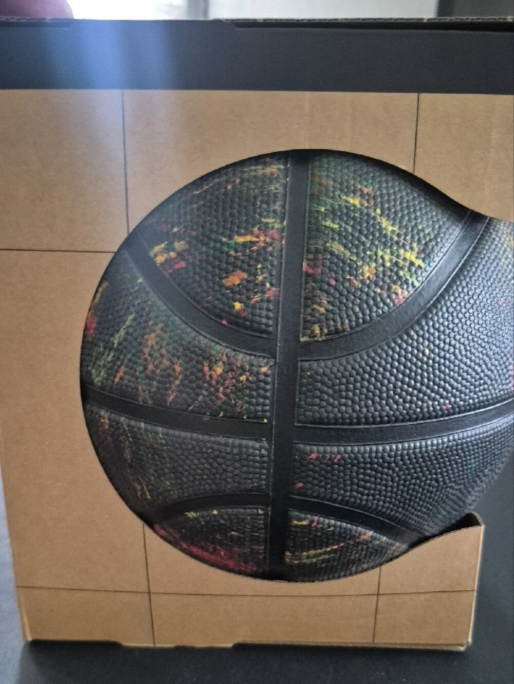 Nike Black Basketball with White Swoosh and Multicolor Specks